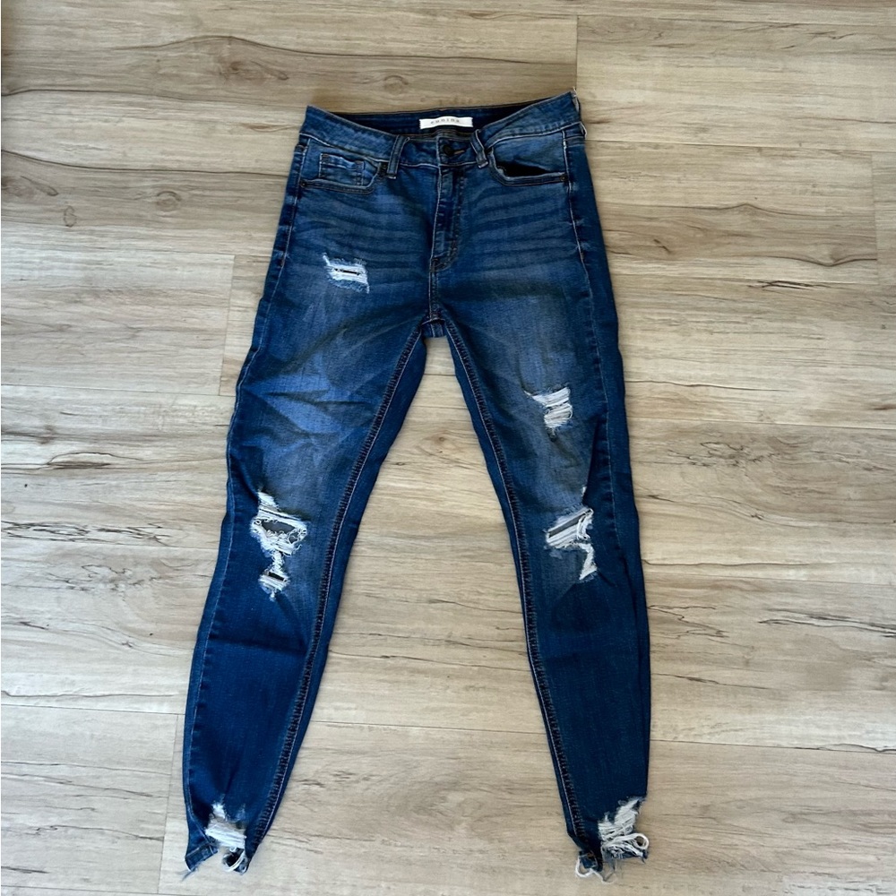 Dark wash distressed skinny jeans